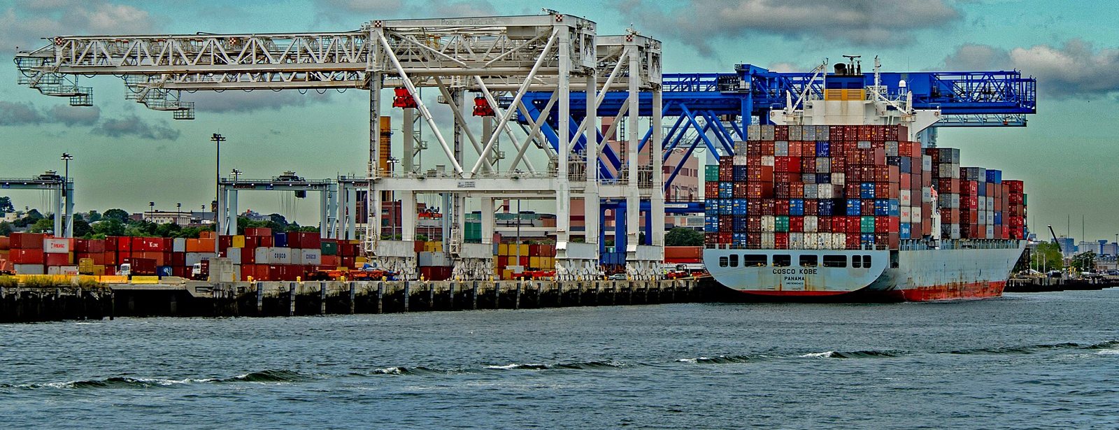 Close-up of a loaded container ship at a deep-water export terminal